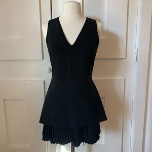 Black skater dress with pleats